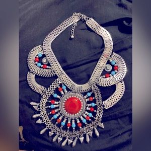 Statement Necklace in silver tone layered with color beads. Coming in 16/18 inch